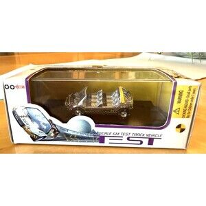 NEW DISNEY WORLD 1/64 SCALE TEST TRACK GM SILVER COLORED VEHICLE MINT IN BOX
